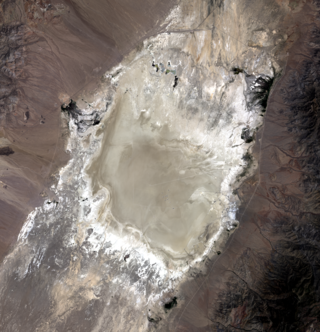 An aerial image looking down at a dry lakebed in Nevada called the Railroad Valley playa.