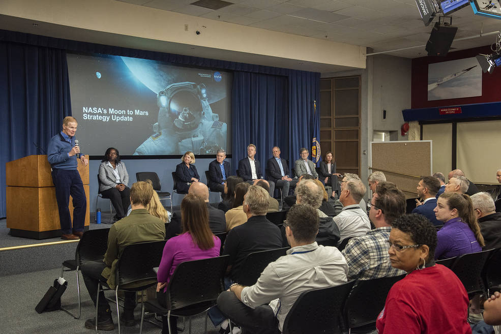 From left, NASA Administrator Bill Nelson, Armstrong deputy center director Laurie Grindle, Deputy Administrator Pam Melroy, Associate Administrator Bob Cabana, and various other members from the Moon to Mars team speak to NASA AFRC employees.
