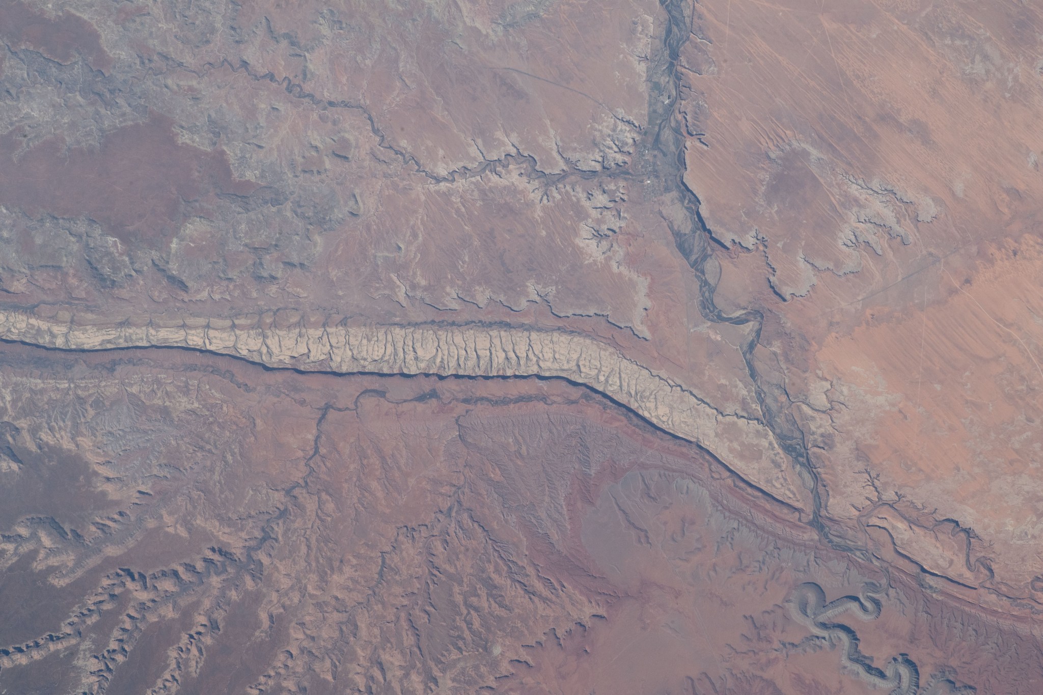 This image shows a portion of Canyonlands National Park in Utah and the San Juan River as the International Space Station orbits 263 miles above.