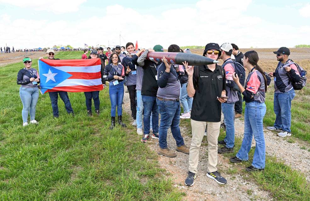Students from the University of Puerto Rico-Mayaguez, carry their rocket to the launch pad during NASA’s 2023 Student Launch challenge near NASA’s Marshall Space Flight Center in Huntsville, Alabama