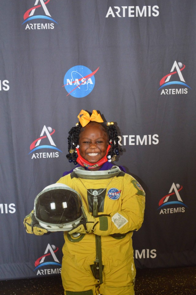 A Pre-K student, part of the Artemis Generation, poses as a NASA astronaut during the NASA Stennis Space Sprouts program in Hattiesburg, Mississippi on Sept. 9, 2022.