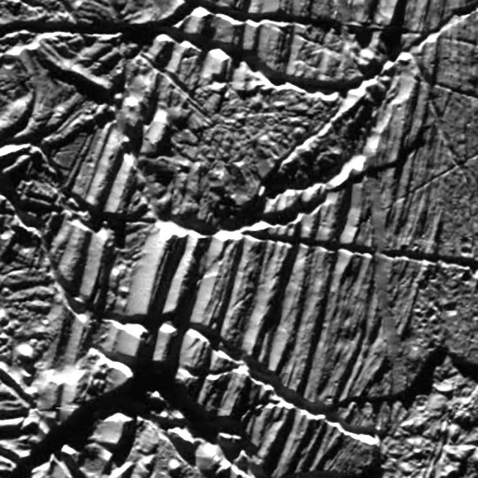 This view of Jupiter’s moon Europa was captured in the 1990s by NASA’s Galileo spacecraft. The smooth slopes and nearby rubble may have been produced by landslides.