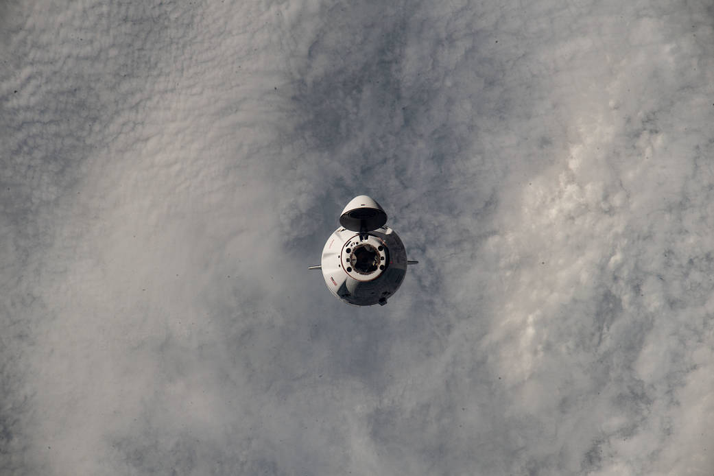 The SpaceX Dragon resupply ship approaches the space station