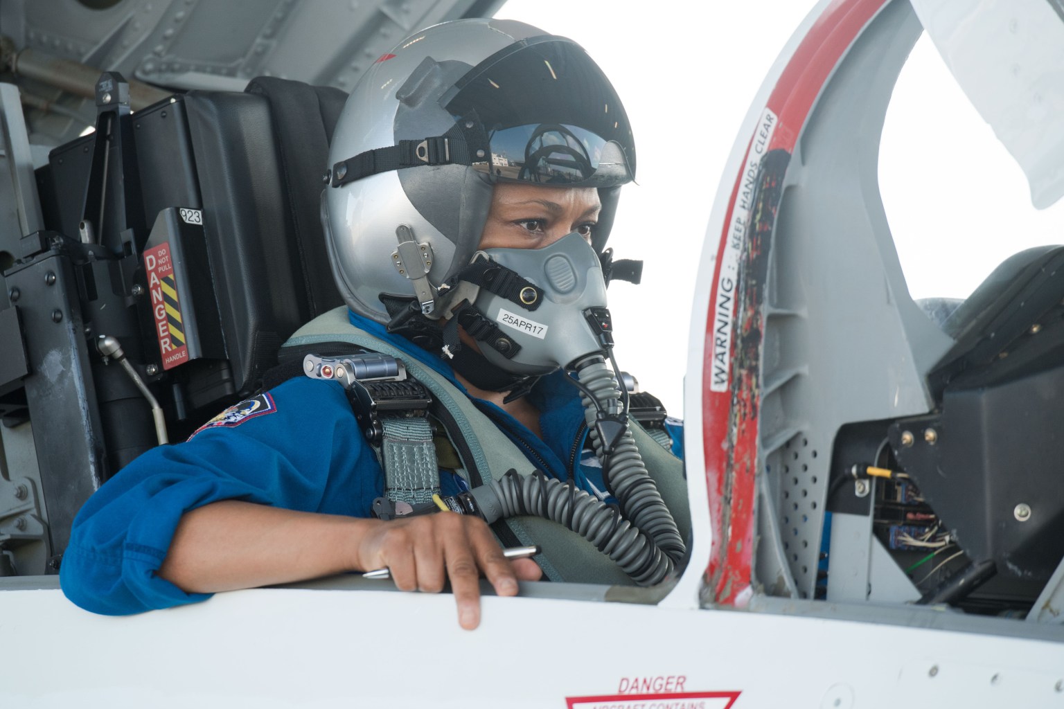 Jeanette Epps during T-38 preparations, walking out to aircraft and in backseat