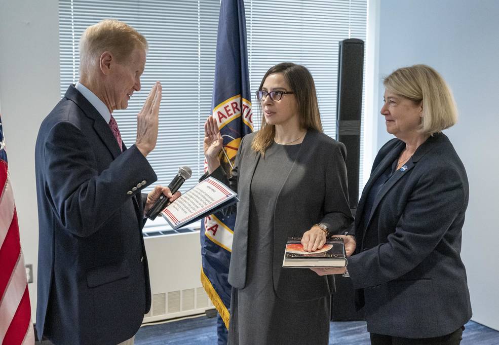 NASA Administrator Bill Nelson, left, swears in Dr. Makenzie Lystrup as Director of Goddard Space Flight Center, as NASA Deputy Administrator Pam Melroy looks on Thursday, April 6, 2023, at the Mary W. Jackson NASA Headquarters building in Washington. 