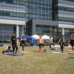 Marshall team members participate in a free yoga class on the south lawn of Building 4221 during the center’s Earth Day celebration.
