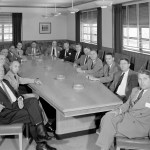NACA's Special Committee on Space Technology at a meeting at the NACA Lewis Flight Propulsion Laboratory in Ohio, May 26, 1958. The members are seated around a conference table facing the camera.