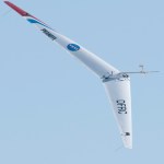 Prandtl-D in flight against a light blue sky.