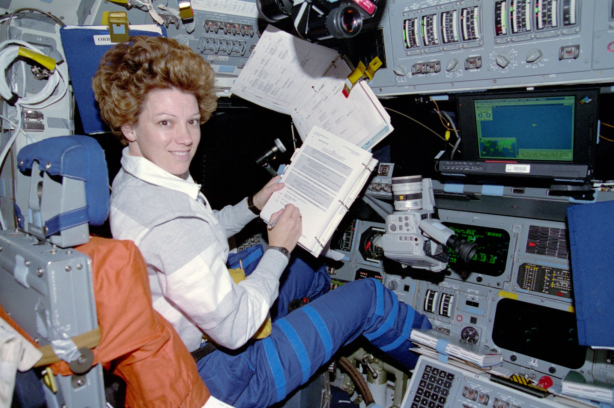 STS-84 pilot Eileen Collins on flight deck of the Atlantis.