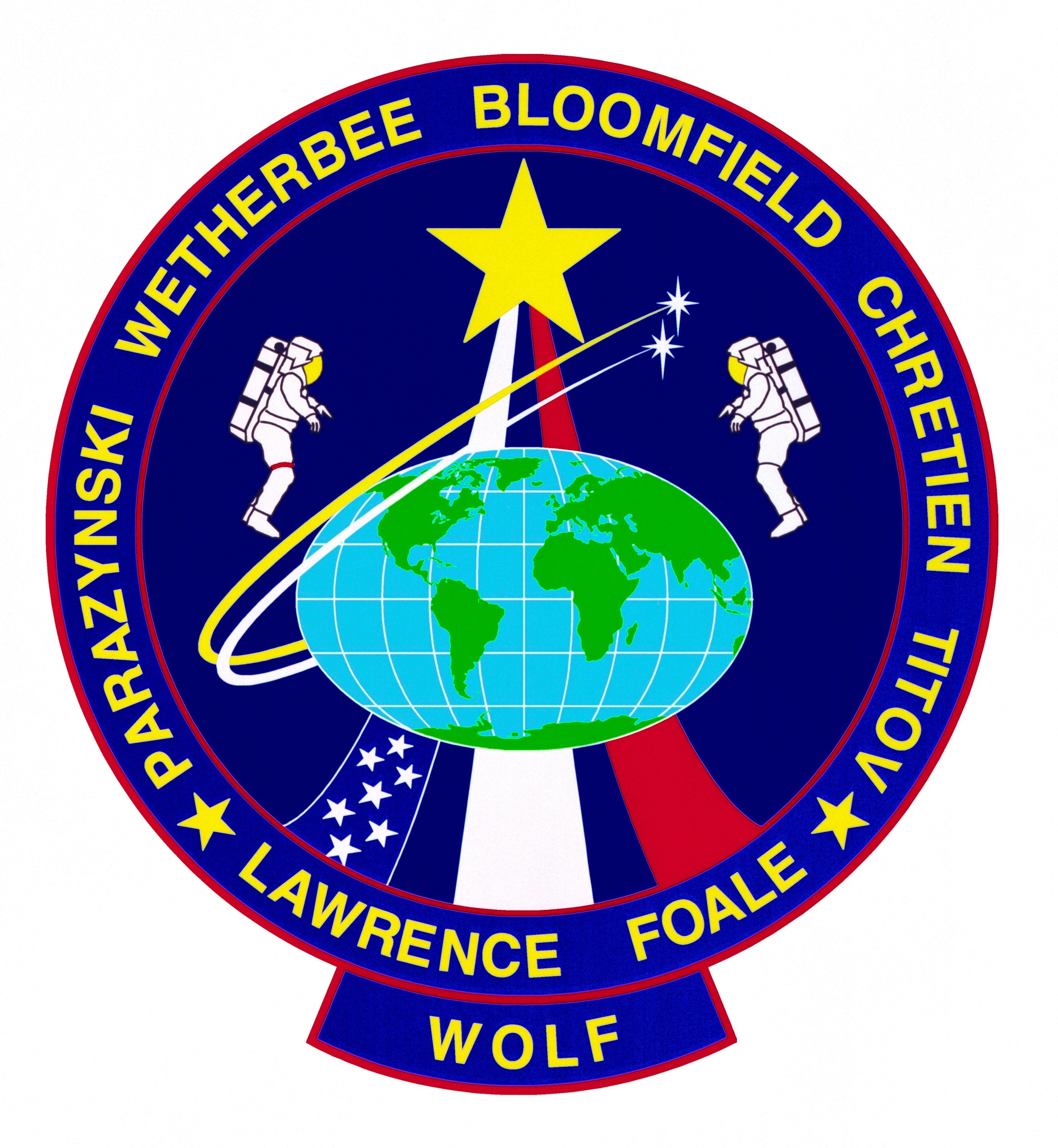 STS-86 crew patch. The flags for the three nations represented on the flight are incorporated in the design and the names of the astronauts ring the patch.