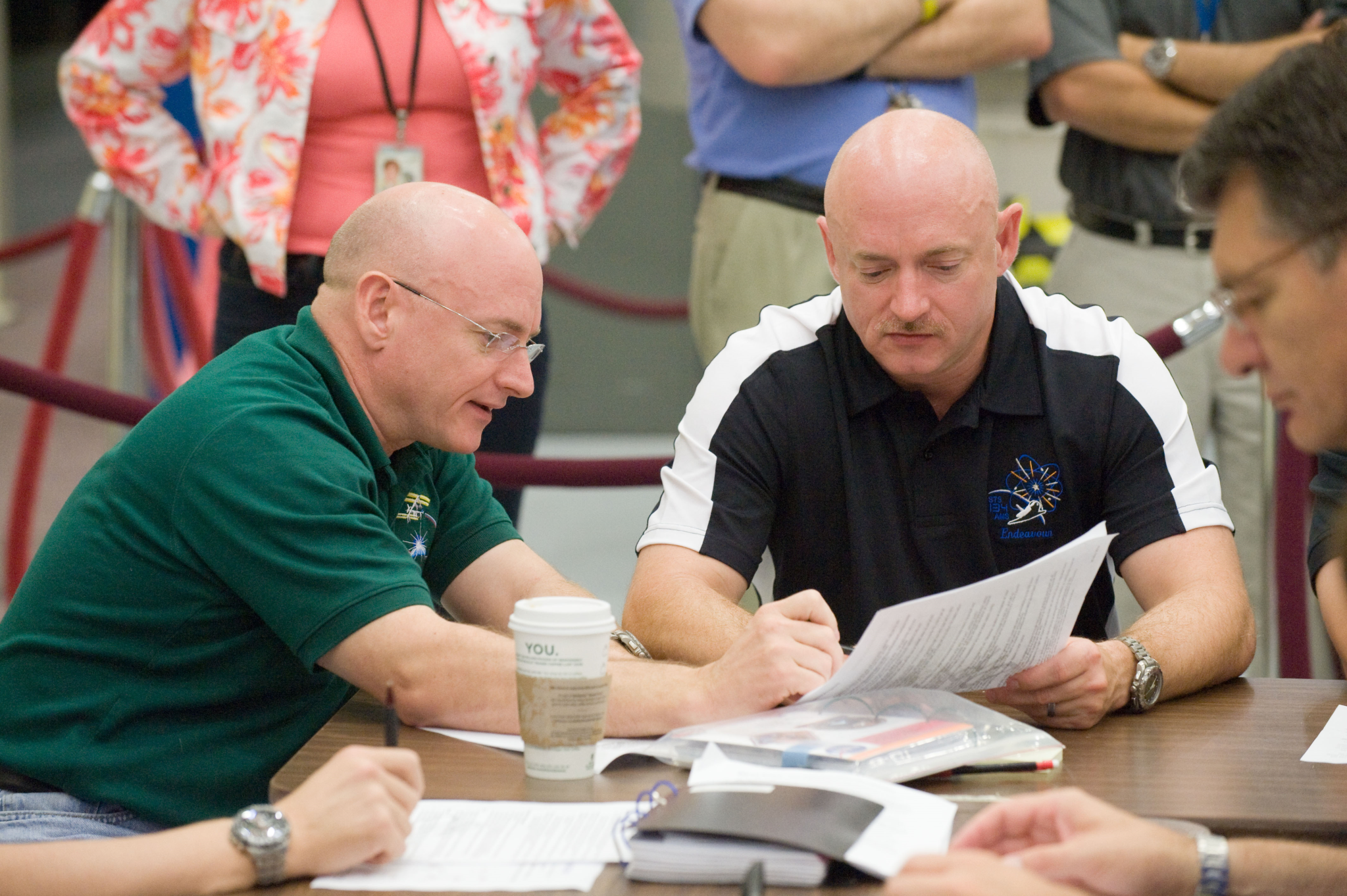 Retired NASA astronaut Scott Kelly (left), and retired astronaut Mark Kelly, pictured at NASA's Johnson Space Center.