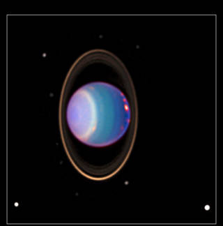 Uranus with a color-added view that uses data taken by the Hubble Space Telescope in 1998
