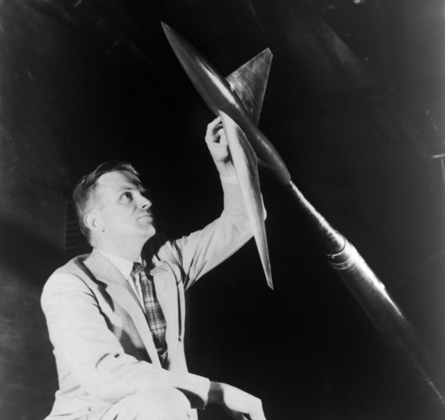Richard Whitcomb examines a model aircraft incorporating his area rule.