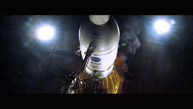 Animated gif showing the Artemis 1 rocket light up the early morning sky on November 16, 2022.