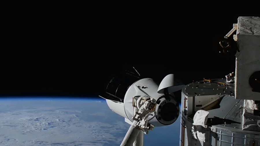 The SpaceX Crew Dragon spacecraft approaches the Harmony module's forward port for a docking during its relocation maneuver above the United States. Credit: NASA TV