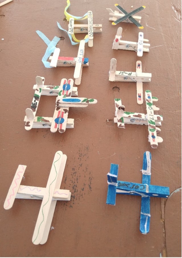 Craft Stick Aircraft image of some of the airplanes made using this craft activity.
