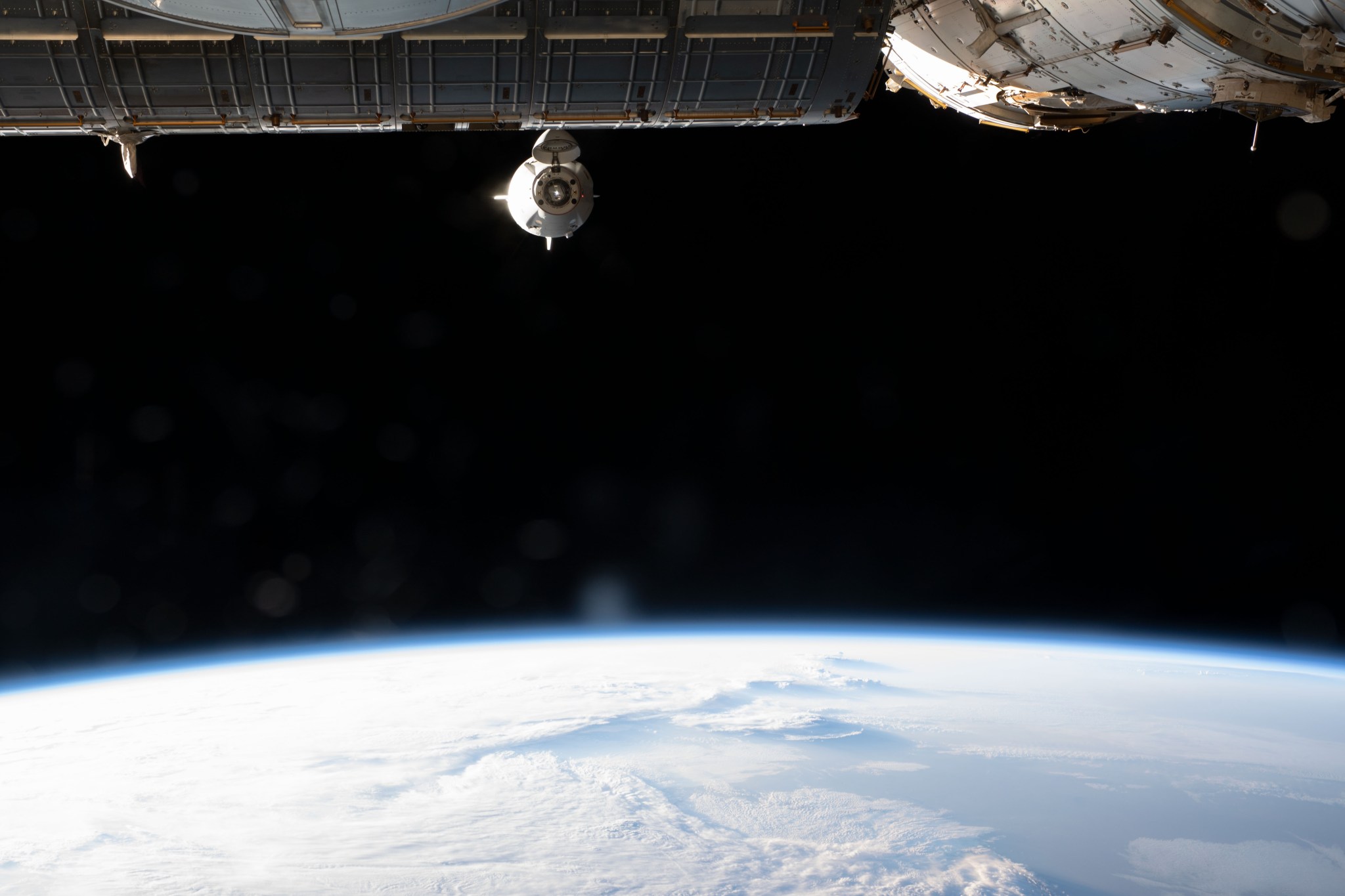 The SpaceX Crew Dragon Endeavour during a relocation maneuver as the International Space Station orbits 265 miles above the U.S-Canadian border.