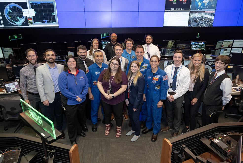 NASA’s SpaceX Crew-5 mission astronauts smile for a group photo after speaking with team members of Marshall’s Payload Operations Integration Center. 