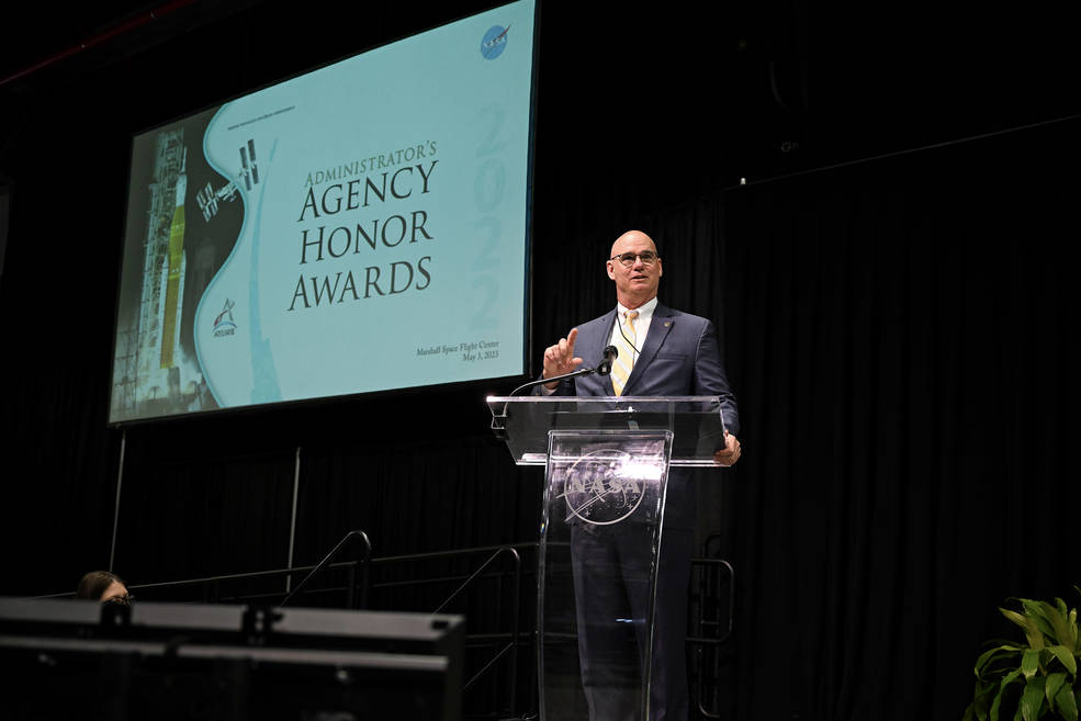 Bill Marks, deputy director of center operations at Marshall Space Flight Center, welcomes guests to the 2022 Administrator’s Agency Honor Awards, which were held May 3 in Marshall’s Activities Building 4316. 