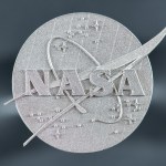 Smith and his team employed time-saving computer modeling, as well as a laser 3D printing process that fused metals together, layer-by-layer, to create the new alloy. They used this process to produce the NASA logo pictured above.
