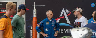 NASA astronaut Drew Feustel and SLS (Space Launch System) employees from Marshall Space Flight Center in Huntsville, Alabama, interact with racegoers during the Miami Grand Prix race weekend May 6-8.