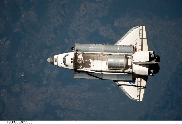 This view of the space shuttle Discovery was provided by an Expedition 23 crew member during a survey of the departing vehicle following undocking from the International Space Station on April 17. The Leonardo Multi-Purpose Logistics Module is visible in Discovery's cargo bay.