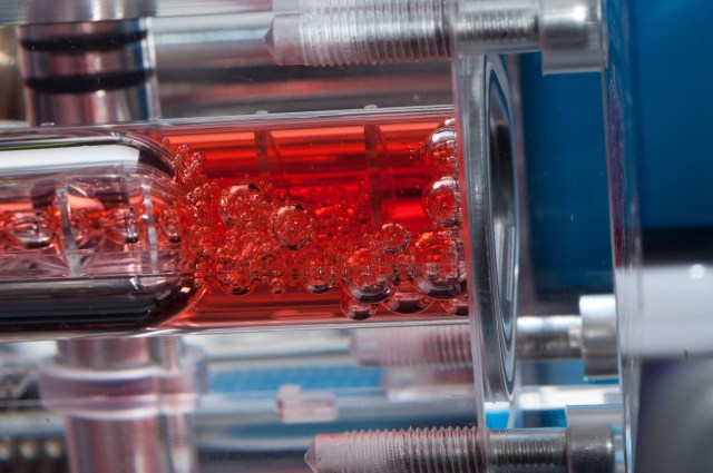 image of red bubbles in experiment hardware