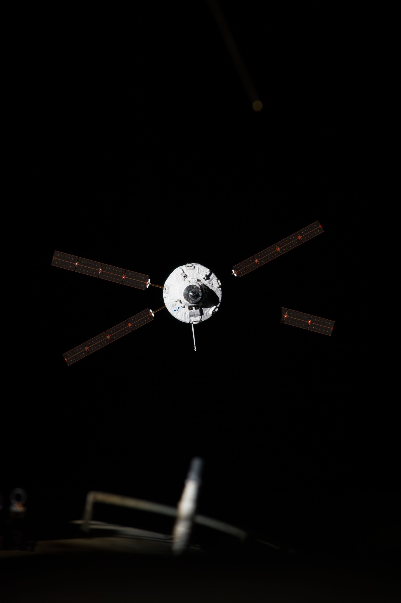 The "Georges Lemaitre" Automated Transfer Vehicle (ATV-5), photographed by an Expedition 40 crew member, approaches the aft port of the International Space Station's Zvezda Service Module. Docking occurred at 8:30 a.m. (CDT) as the ATV and the station flew 260 miles over southern Kazakhstan, following a two-week period of free-flight.