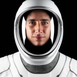 A portrait of NASA astronaut and Crew-7 Commander Jasmin Moghbeli in her white SpaceX spacesuit.
