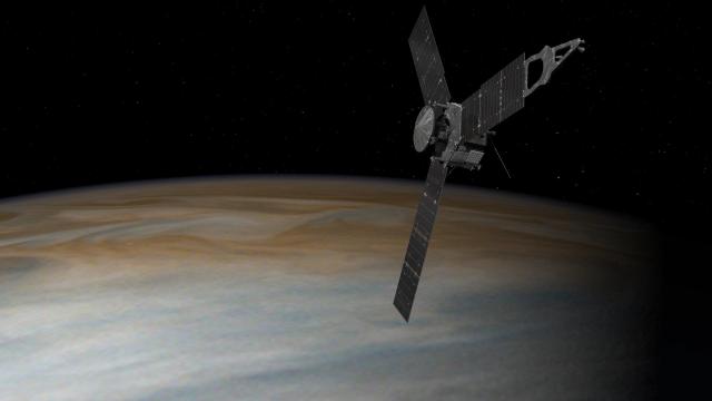 This illustration depicts NASA's Juno spacecraft in orbit above Jupiter.