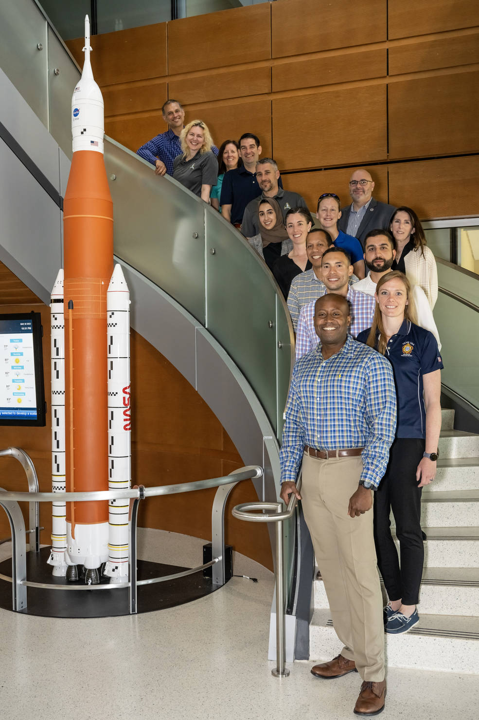 NASAs 2021 astronaut candidates class took a group photo during their visit to Marshall Space Flight Center on May 24 with senior leaders in Building 4221.