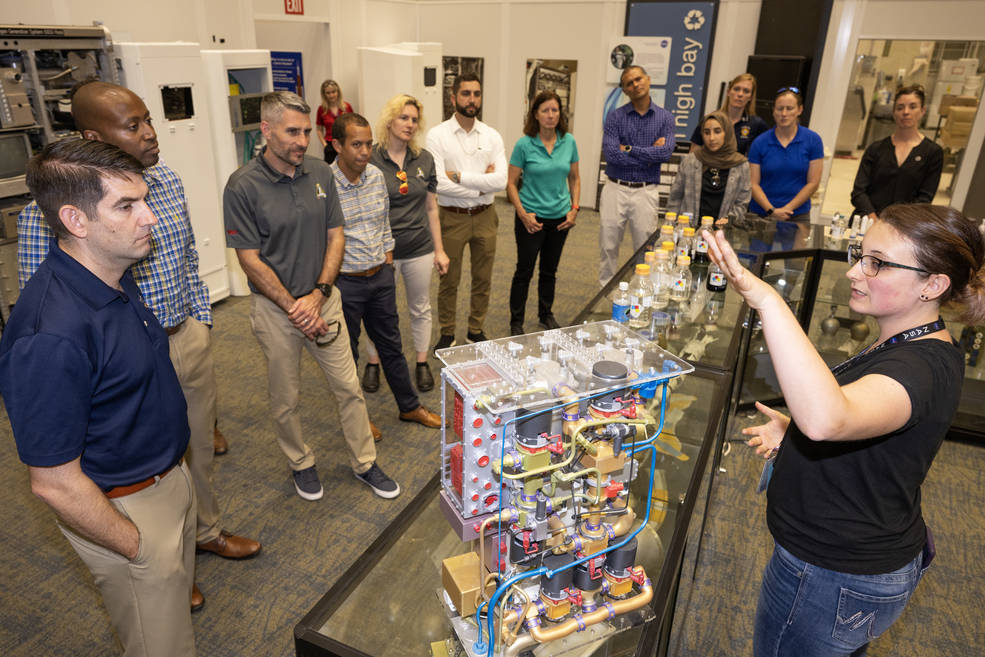 Marshall team member Kaitlin Oliver-Butler briefs members of the 2021 astronaut candidate class on the Environmental Control and Life Support System. ECLSS is a system of regenerative life support hardware.