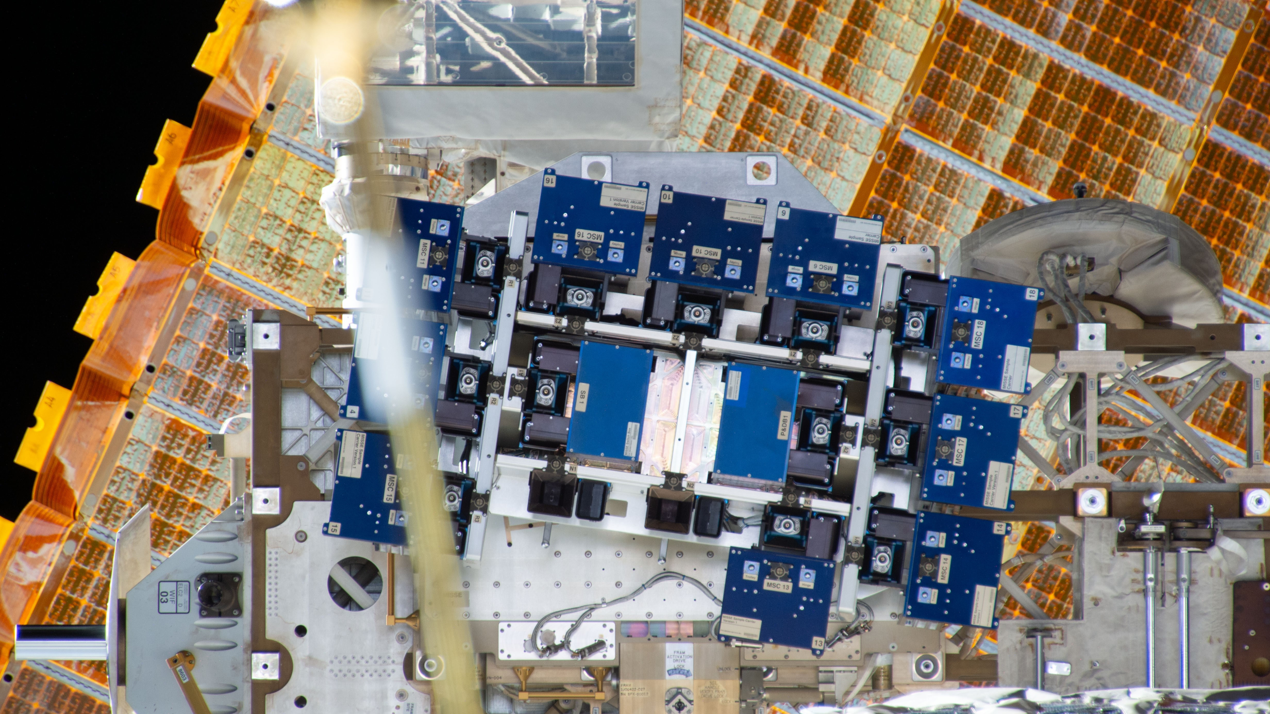 An image of the perovskite samples inside the MISSE Platform installed on the exterior of the International Space Station.