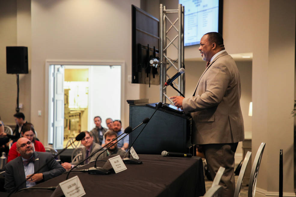 Dwight Mosby, manager of the Payload and Mission Operations Division at NASA’s Marshall Space Flight Center, addresses audience members during the Payload Operations Integration Working Group meeting held at the Huntsville Botanical Gardens on April 25. 