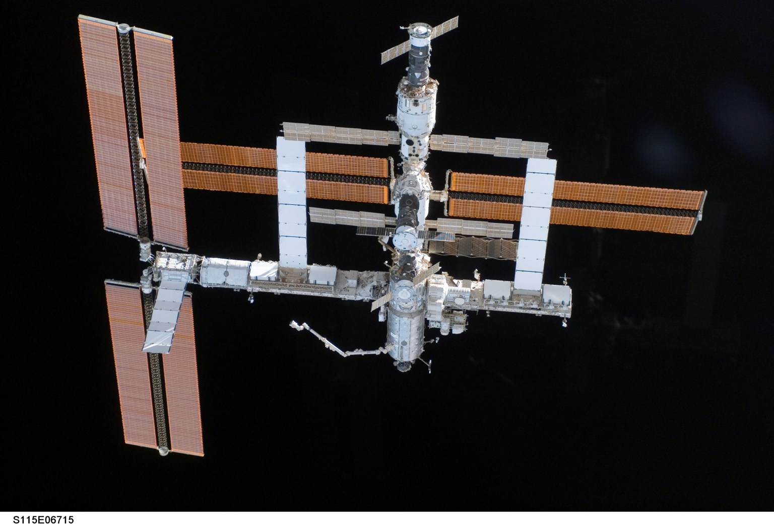 The new P3/P4 (Port) truss segments with its solar arrays deployed are pictured from space shuttle Atlantis after it undocked from the International Space Station on Sept. 17, 2006.