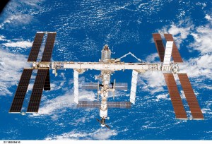 S118-E-09416 (19 Aug. 2007) --- Backdropped by a blue and white Earth, the International Space Station moves away from Space Shuttle Endeavour. Earlier the STS-118 and Expedition 15 crews concluded nearly nine days of cooperative work onboard the shuttle and station. Undocking of the two spacecraft occurred at 6:56 a.m. (CDT) on Aug. 19, 2007.