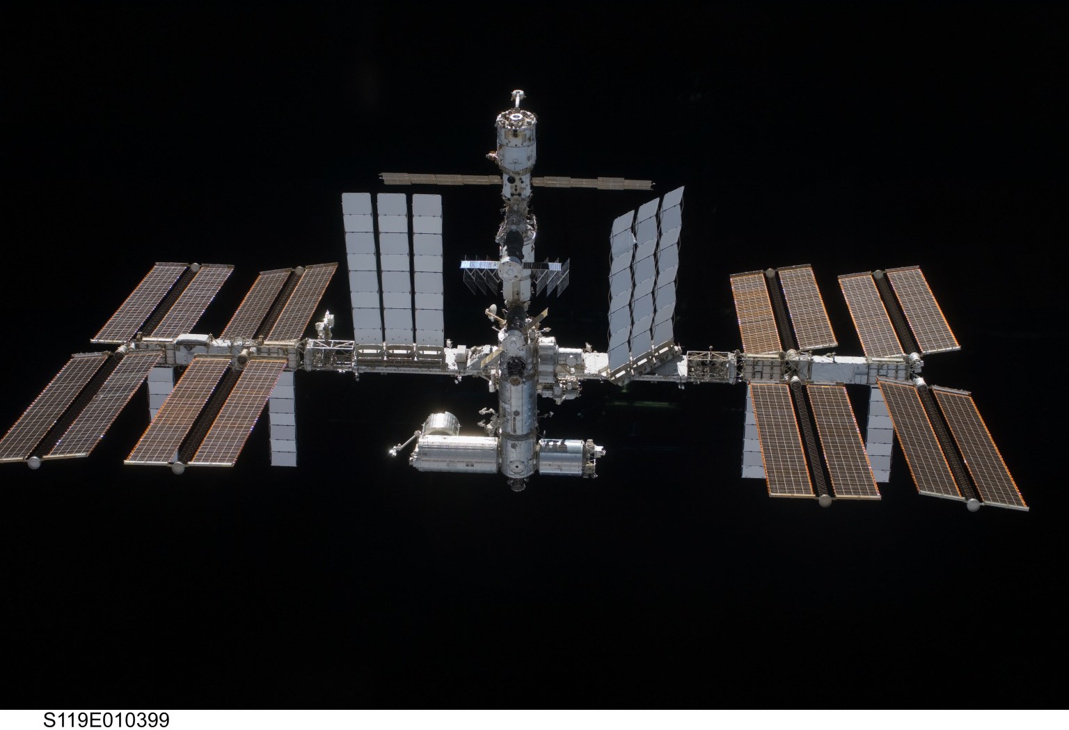 The installation of the S6 (Starboard) truss segment completes the assembly of the International Space Station's Integrated Truss Structure. The orbital outpost was pictured from space shuttle Discovery after it undocked on March 25, 2009.