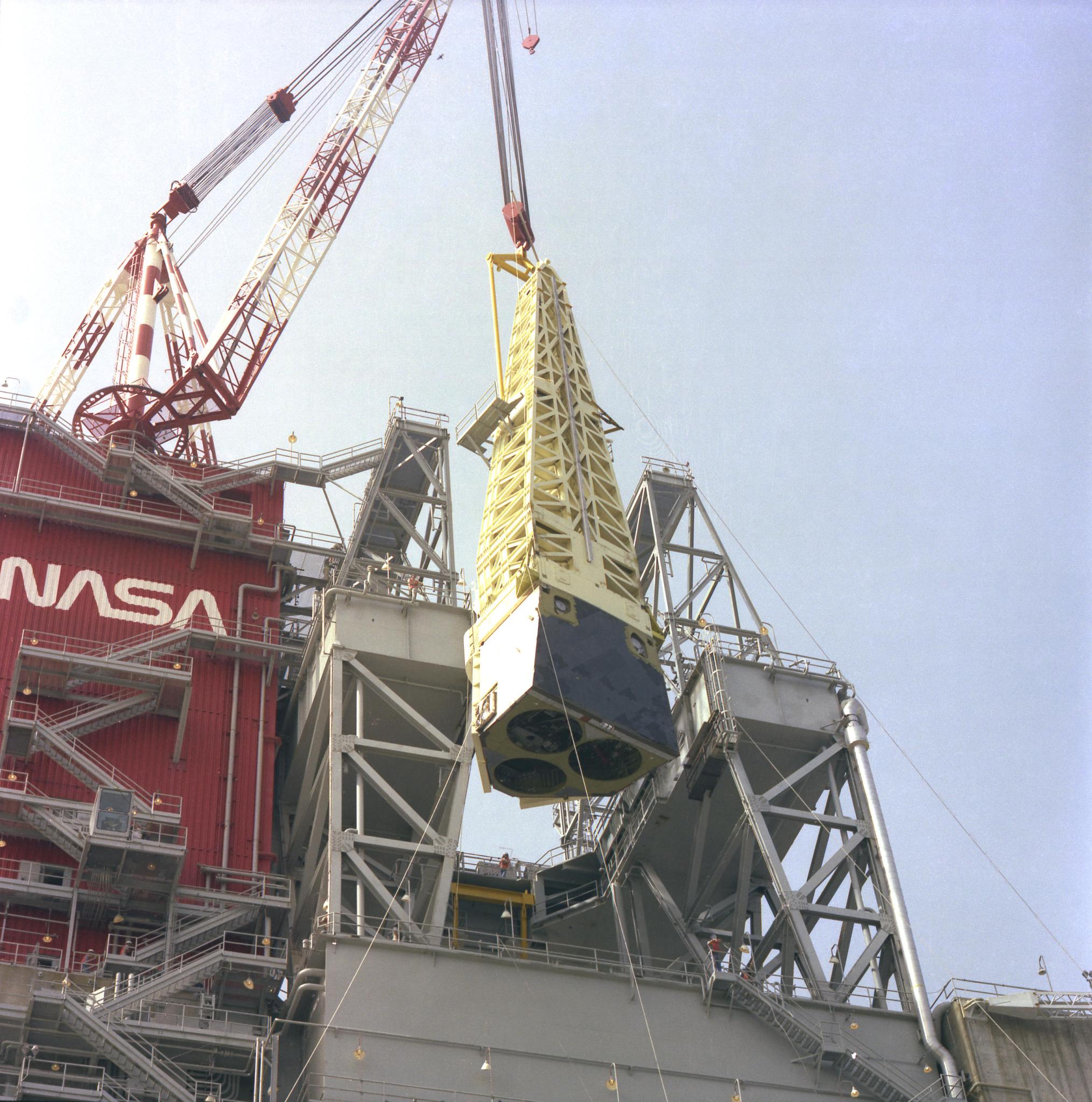 A space shuttle main propulsion test article (MPTA) component is lifted onto the B-2 Test Stand at NASA’s Stennis Space Center, then known as National Space Technology Laboratories, in this 1977 photo.
