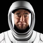 A portrait of JAXA (Japan Aerospace Exploration Agency) astronaut and Crew-7 Mission Specialist Satoshi Furukawa in his white SpaceX spacesuit,