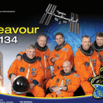 Screen shot of the Endeavour STS-134 crew poster showing six astronauts in orange flight suits, the mission patch, the space shuttle, the ISS, and some text pertaining to the mission