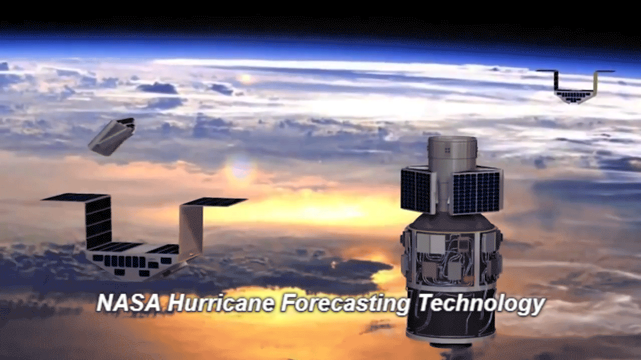 This is a gif of satellite-borne instrumentation being deployed over Earth. There is text in the gif that reads "NASA Hurricane Forecasting Technology."