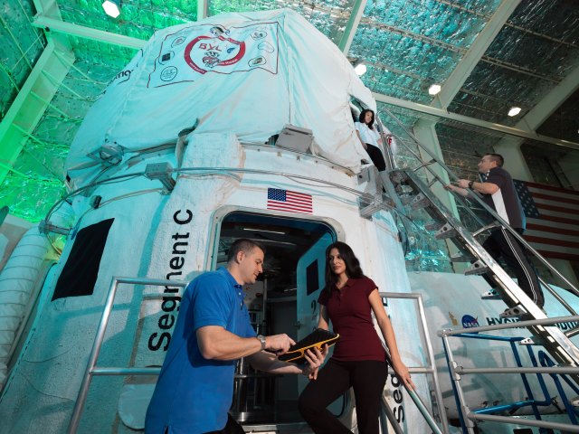 Researchers are pictured outside the Human Exploration Research Analog (HERA), located at NASA's Johnson Space Center. The closed habitat is a unique 650-square-feet space that is split among two floors and a loft, designed to serve as an Earth-bound mission for isolation, confinement, and remote conditions in exploration scenarios.