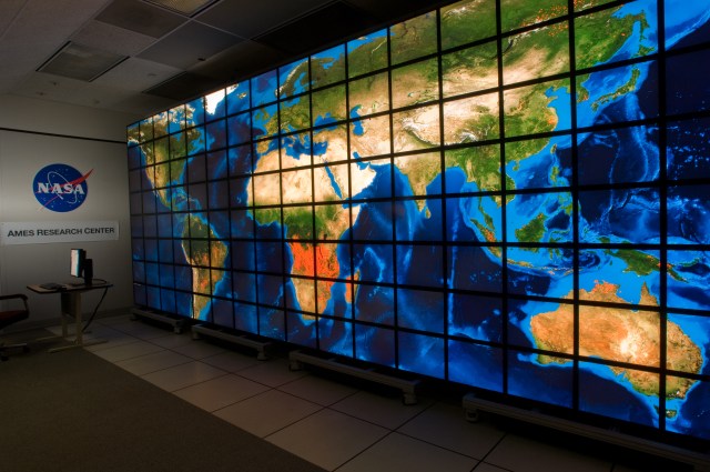 The hyperwall at Ames Research Center, a wall of monitors combined to display a giant image. In this case, it is showing a map of the world.