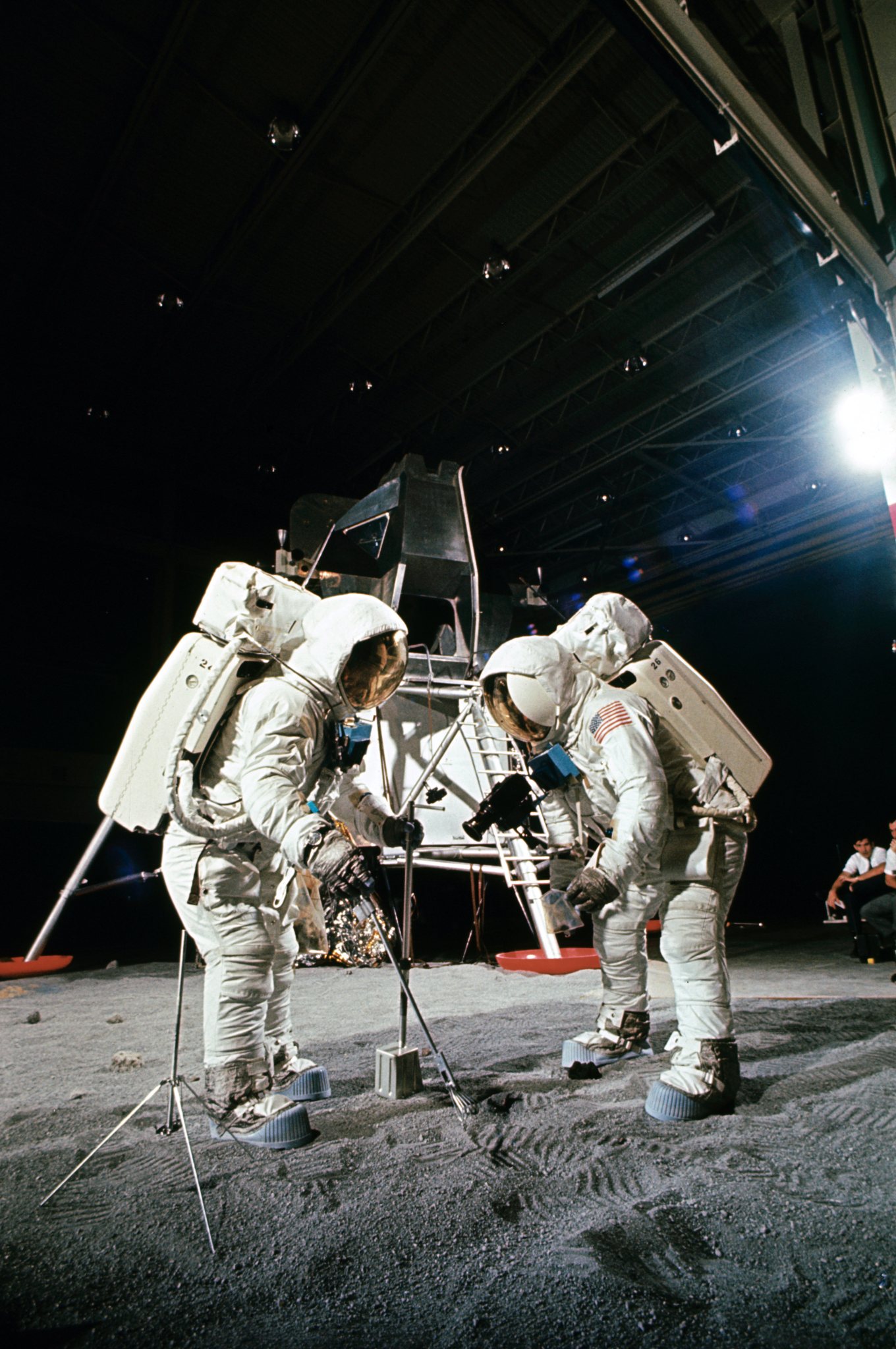 Neil Armstrong and Buzz Aldrin do lunar EVA training prior to their mission.