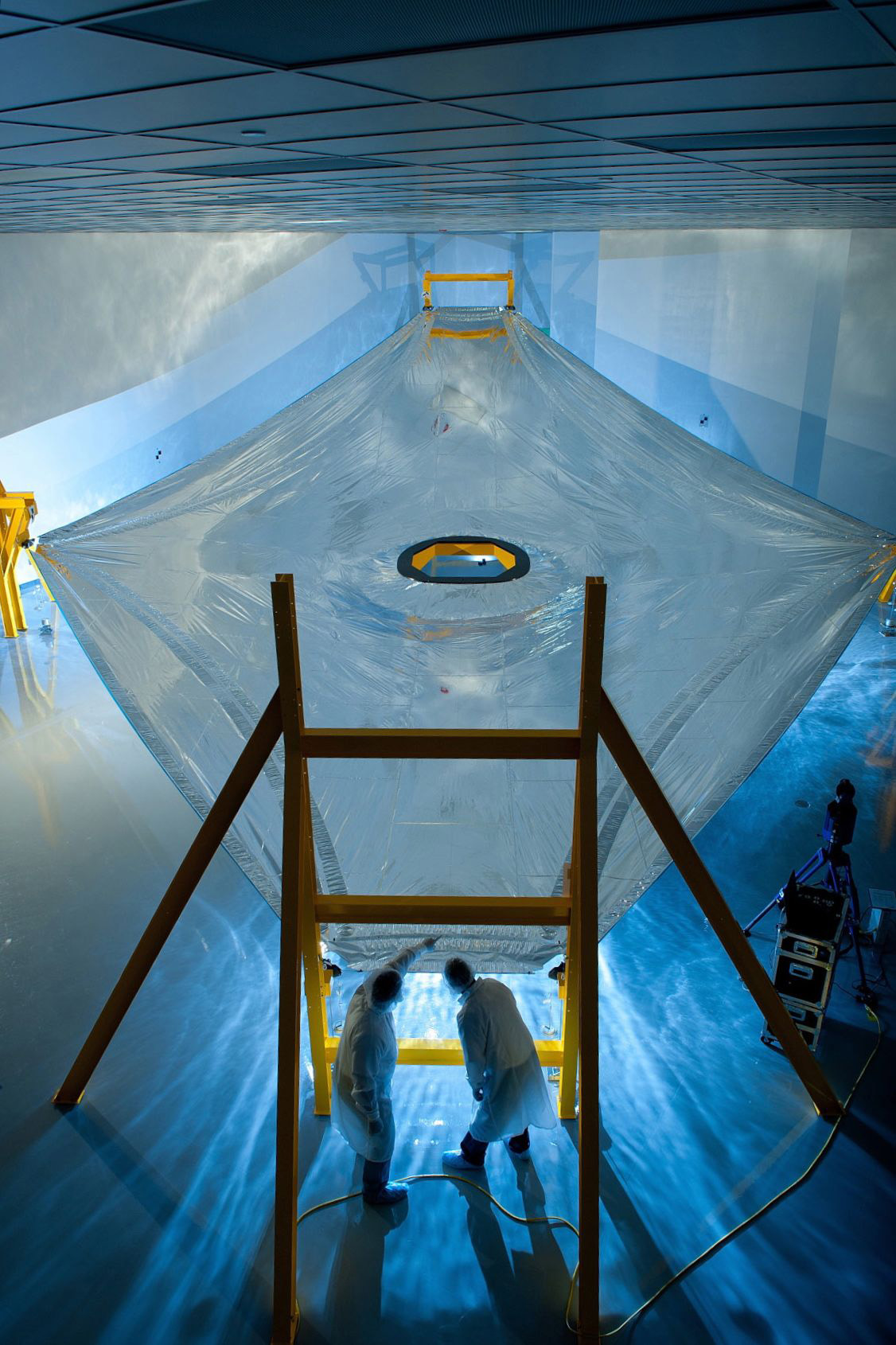 One full-scale Webb telescope sunshield membrane deployed on the membrane test fixture.