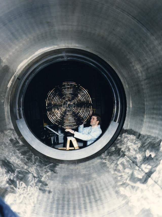 A NASA technician working on the Methane Spray bar.