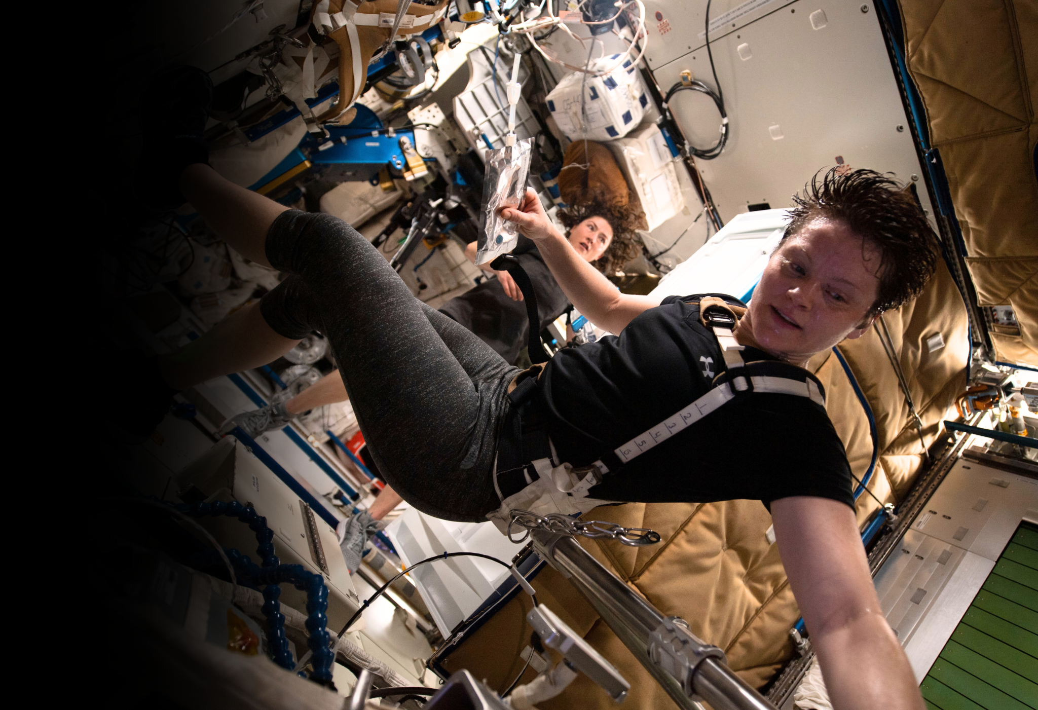 NASA astronaut Anne McClain exercises in the Node 3 module.