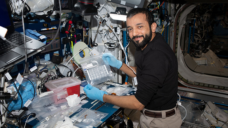 Astronaut Sultan Alneyadi sets up hardware for a protein crystal growth experiment on May 30, 2023, that may shorten the development cycle for new drugs.