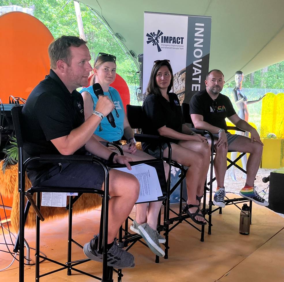 NASA Marshall Public Affairs Officer Jonathan Deal, left, leads an Earth Science panel discussion June 15 at the Bonnaroo Music and Arts Festival in Manchester, Tennessee.