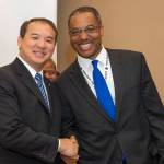 Steve Shih, NASA associate administrator for Diversity and Equal Opportunity, is greeted after his opening address by Melvin McKinstry, supervisory budget analyst in Marshall’s Office of the Chief Financial Officer.